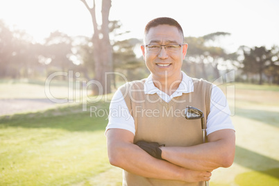 Portrait of golfer posing with his arms crossed Portrait of golfer posing with his arms crossed