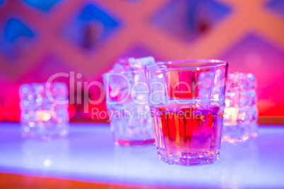 Glass of whiskey at nightclub