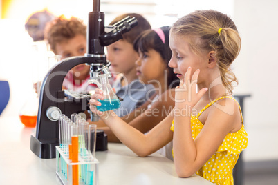 Girl looking at chemical
