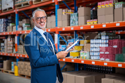 Business man is smiling during his work