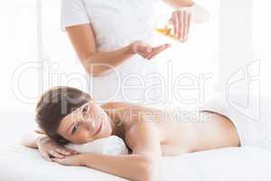 Portrait of woman receiving massage