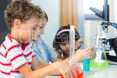 Schoolchildren with scientific equipment