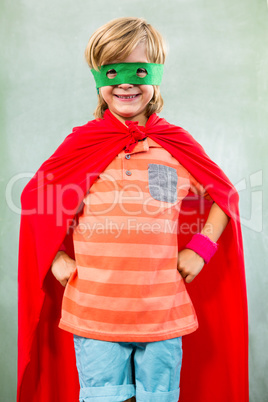 Boy dressed as superhero standing in classroom Boy dressed as superhero standing in classroom