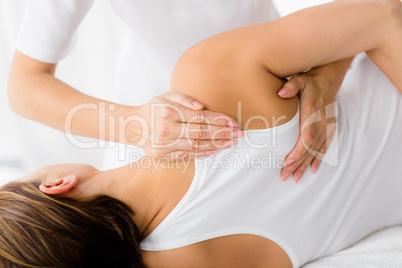 Woman receiving massage treatment