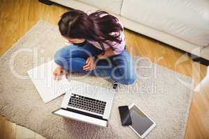 High angle view of woman with laptop