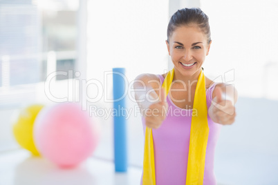 Portrait of happy woman at fitness studio