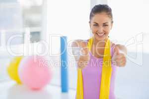 Portrait of happy woman at fitness studio