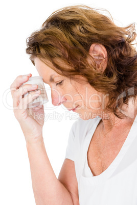 Mature woman holding pills bottle