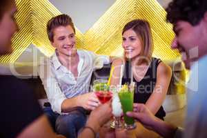 Joyful friends enjoying in nightclub