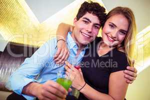 Portrait of happy couple in nightclub