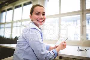 Businesswoman holding document