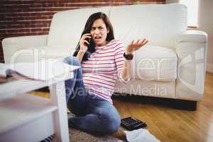 Young woman talking on phone