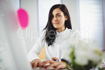 Focused woman working in office