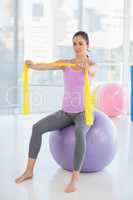 Woman sitting on exercise ball