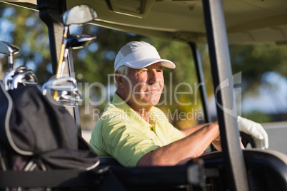 Thoughtful golfer man looking away