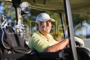 Thoughtful golfer man looking away