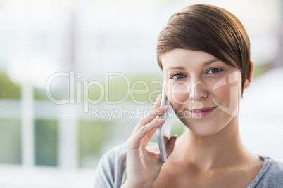 Portrait of woman talking on phone