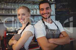 Portrait of confident workers at cafe