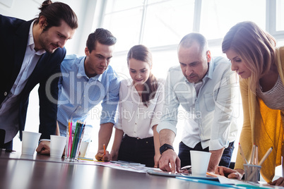 Serious photo editors looking at photos