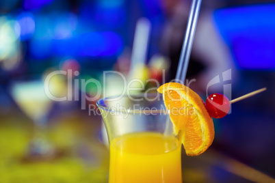 Glass of drink on counter