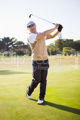 Portrait of sportsman playing golf