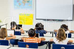 Children using digital tablets