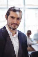 Confident businessman in meeting room