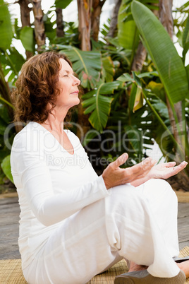 Relaxed woman doing yoga