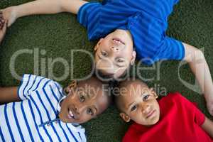 High angle portrait of children forming huddle