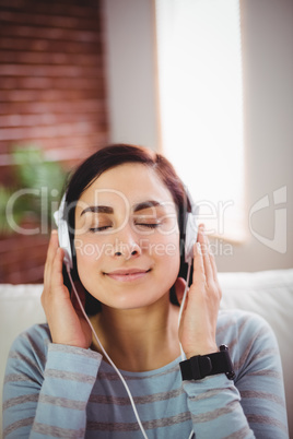 Beautiful woman listening to music