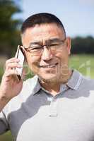 Portrait of golfer smiling and calling