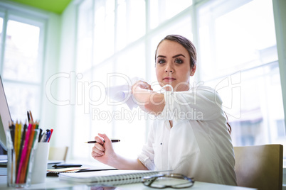 Angry graphic designer throwing paper