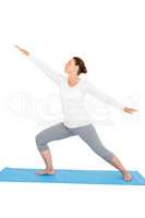 Full length of woman with arms outstretched while exercising