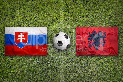Slovakia vs. Albania flags on soccer field
