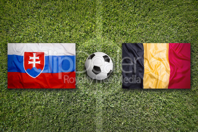 Slovakia vs. Belgium flags on soccer field