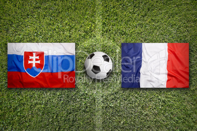 Slovakia vs. France flags on soccer field