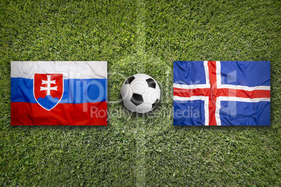 Slovakia vs. Iceland flags on soccer field