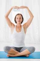 Full length of woman doing yoga