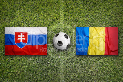 Slovakia vs. Romania flags on soccer field