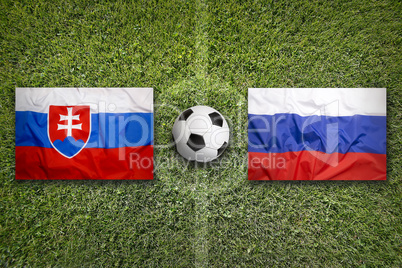 Slovakia vs. Russia flags on soccer field
