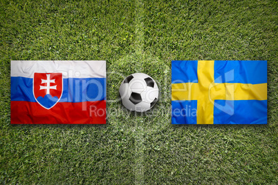 Slovakia vs. Sweden flags on soccer field