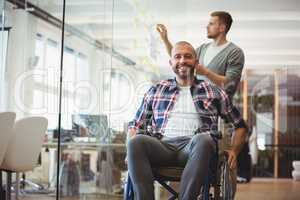 Portrait of handicap businessman in creative office
