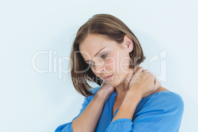 Woman suffering from neck pain