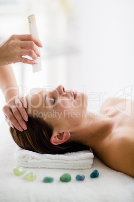 Young woman receiving massage treatment