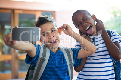 Classmates taking selfie at school