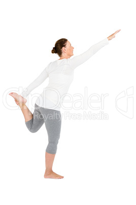 Full length of mature woman exercising