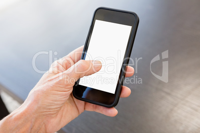 Person holding mobile phone
