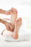 Cropped image of woman receiving foot massage