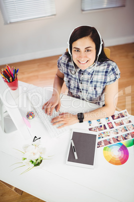 Portrait of smiling young woman in office