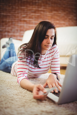 Young woman doing online shopping